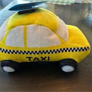 Bark Yellow and Black Plush Taxi Dog Toy with Soft Texture and Cartoonish Shape
